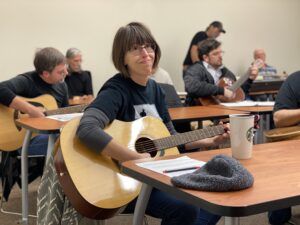 Joanne Daschel in OCCC Guitar Class with Richard Paris.