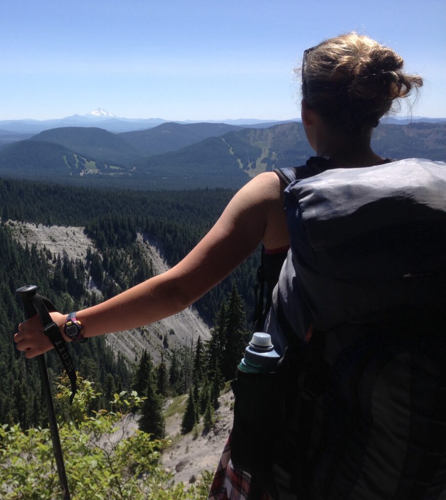 Young woman backpacking in Central Oregon.
