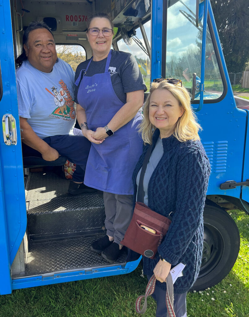 Three people in food truck