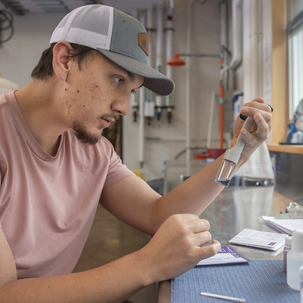 Student working in Aquarium Science Lab