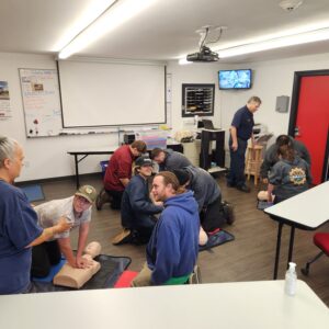 Students learning CPR