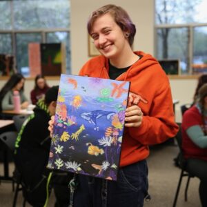 student with art