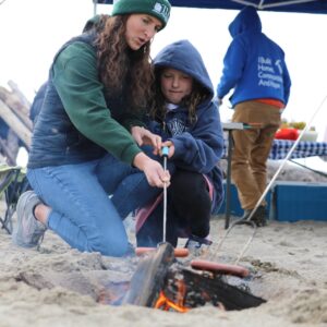 Supporters at a beach fire